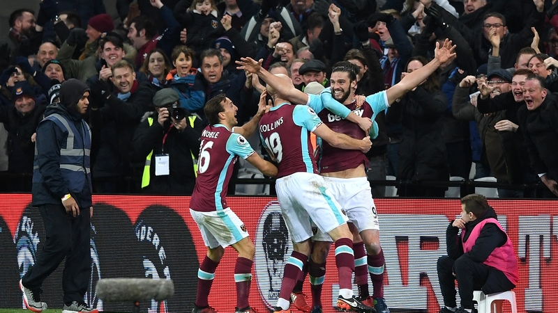 Andy Carroll celebrates his spectacular strike