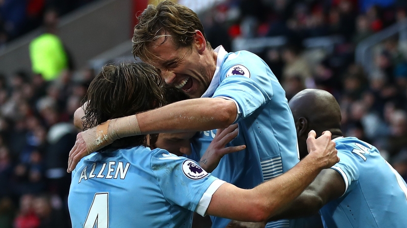 Peter Crouch celebrates scoring his 50th goal for Stoke City