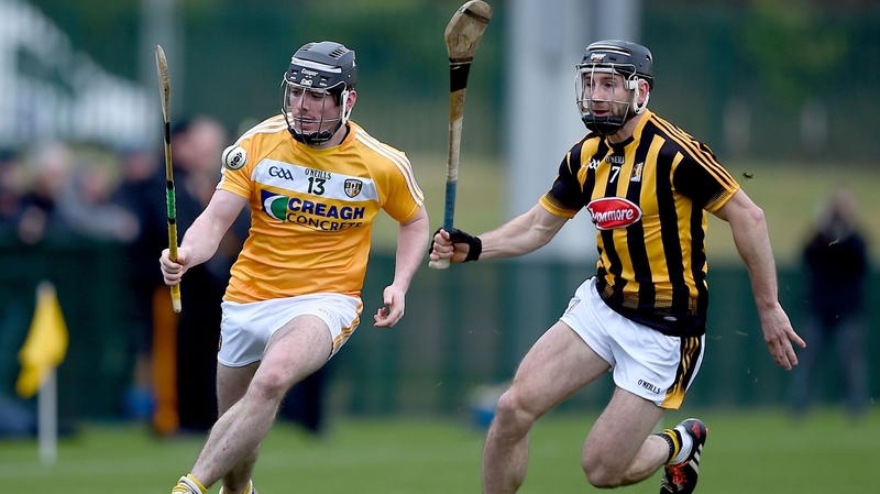 Antrim's Ciaran Clarke with Conor Fogarty of Kilkenny