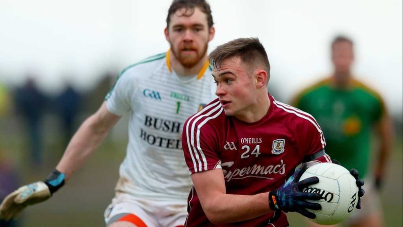 Leitrim goalkeeper Phillip Farrelly bears down on Galway's Cillian McDaid