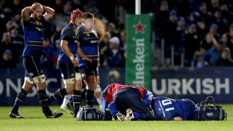 Sexton receives attention after a high tackle during the Champions Cup win over Montpellier