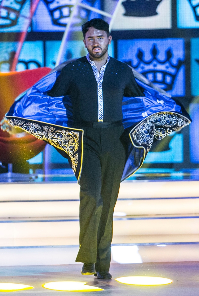 Week 1: Hughie brings some fierce attitude to the stage and a dramatic costume.