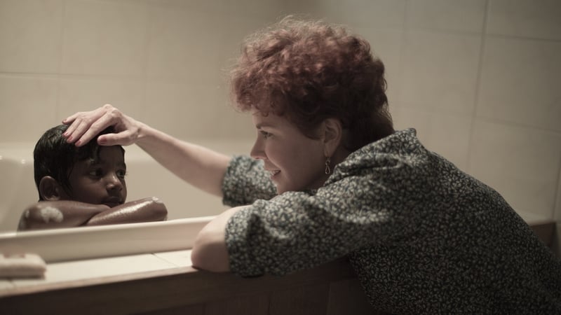 Nicole Kidman plays Sue, an Australian woman who adopts a young boy from India