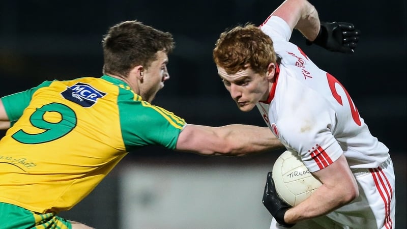 Tyrone's Peter Harte goes past Tony McCleneghan