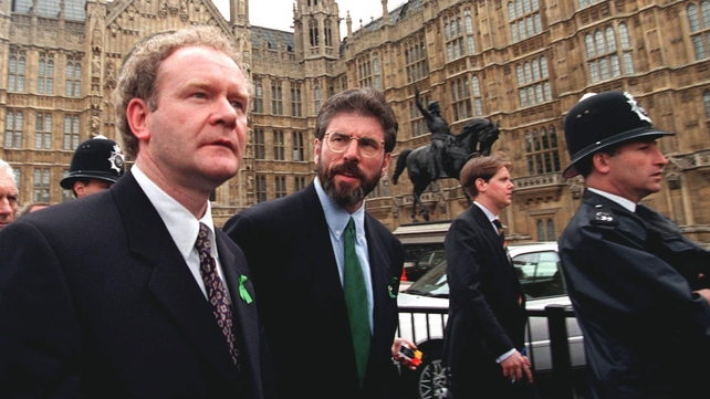 Newly-elected Sinn Féin MPs Adams and McGuinness leave Parliament at Westminster after challenging an order barring them from the premises for refusing to swear allegiance to Queen Eilzabeth