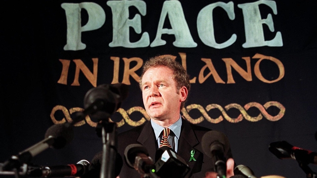 McGuinness answers question during a press conference in London on 26 February 1998