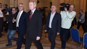 Martin McGuinness walks through the Great Hall at Stormont after failing to nominate a candidate for the role of Deputy First Minister triggering a snap election
