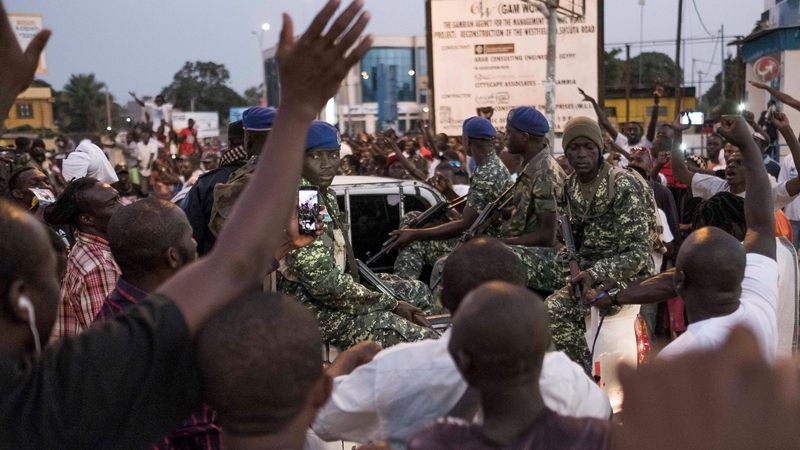 Gambians celebrate the inauguration of new president Adama Barrow