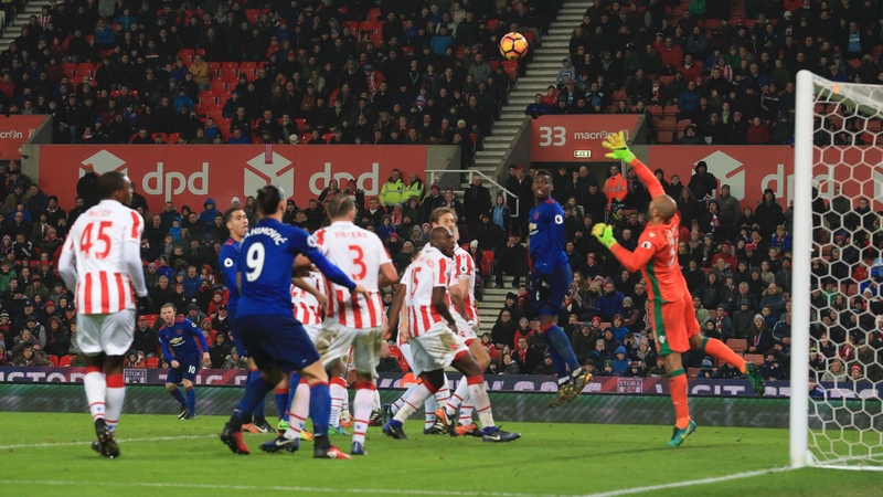 Wayne Rooney's injury-time free kick heads for goal
