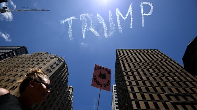 A view of the skywriting word reading 'Trump' as thousands rally in support of equal rights in Sydney, Australia