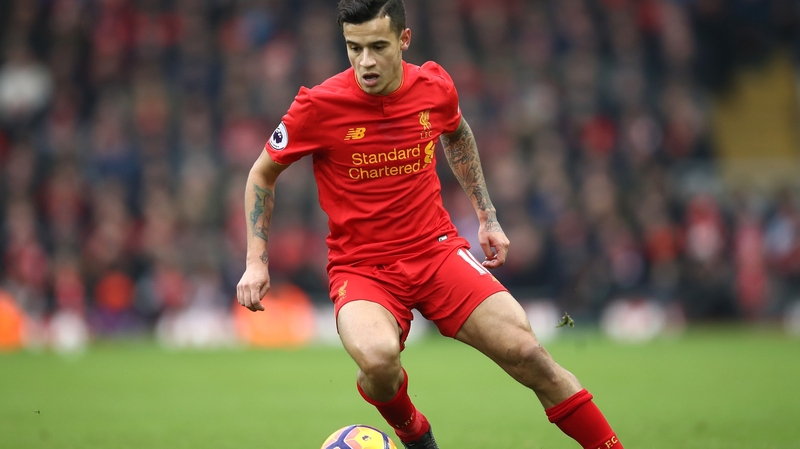 Coutinho in action for Liverpool during their Premier League defeat to Swansea at Anfield