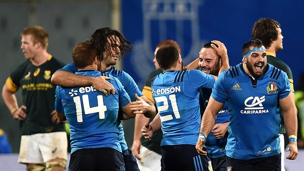 Italy players celebrate November's win over South Africa