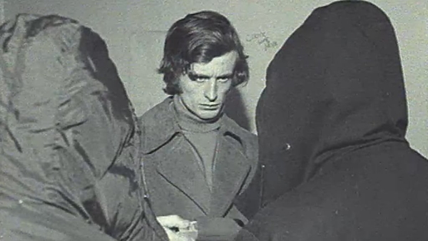 Reporter Eddie Barrett with two hooded IRA Members on Bloody Sunday 1972