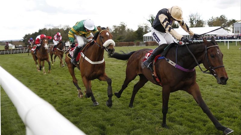 Ruby Walsh and Bellshill winning the Novice Hurdle at Punchestown last April