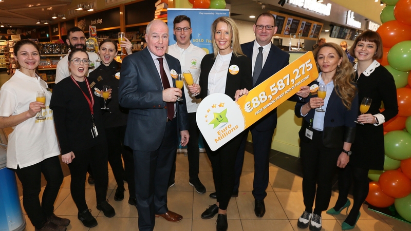 Staff at the service station on the M1 toast the win
