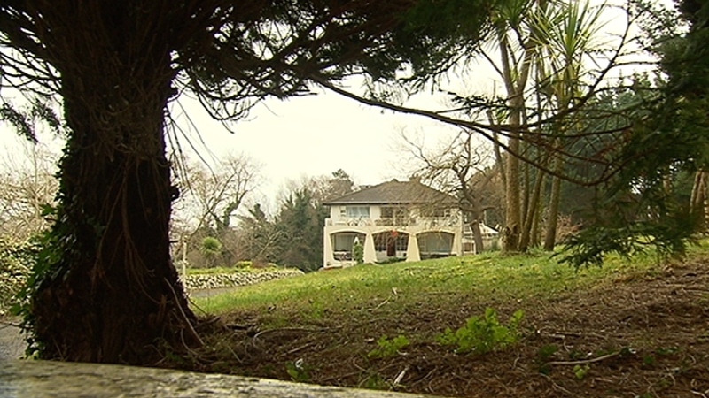 Up to 17 people were living in one room, with dozens more in the basement