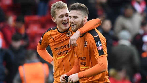 Matt Doherty (r) was one of the heroes for Wolves as they beat Liverpool