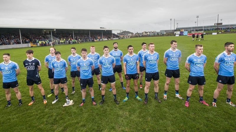 Dublin players stand for attention ahead of throw-in in Drogheda