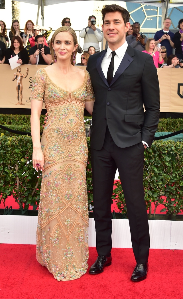 Emily Blunt, in an embellished Roberto Cavalli gown, with hubby John Krasinski.
