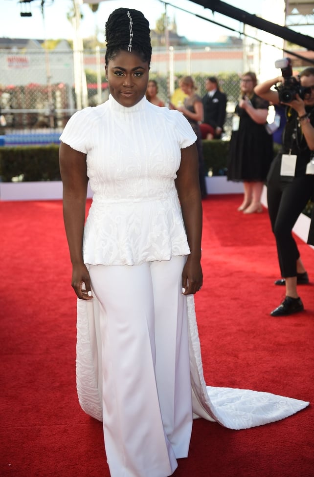 Mmmm: Orange is the New Black star (Taystee) Danielle Brooks' looks beautiful in her Christian Siriano top paired with white trousers but the whole outfit could do with a once-over.