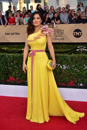 Salma Hayek: The actress shone in a buttercup yellow Gucci number paired with Irene Neuwirth jewelry.