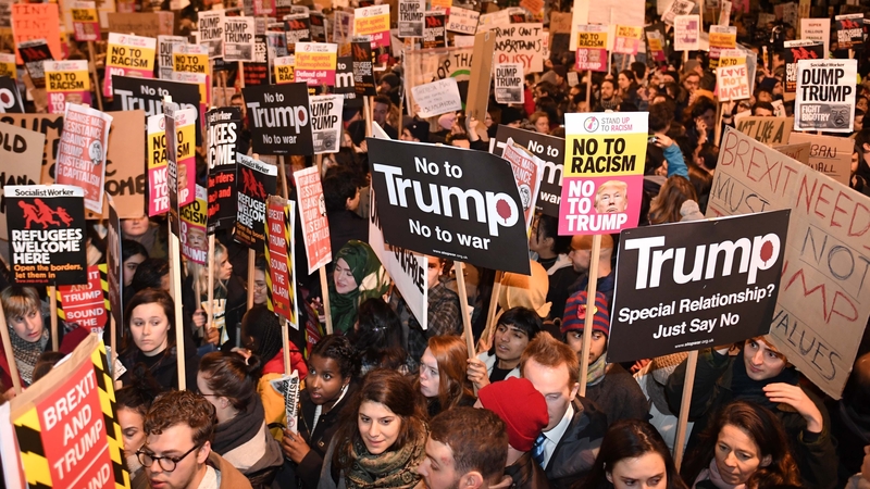 A large crowd protested outside Downing St this evening