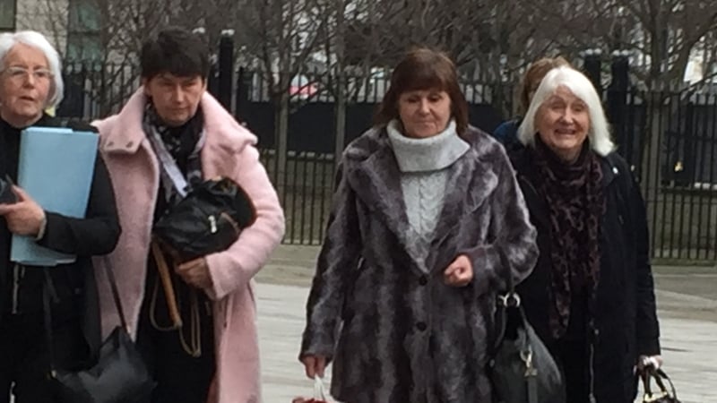 Bernadette McFall (left) and Molly Gilbert (second from right) at Laganside Courts where they gave evidence to the inquest into their brother's death