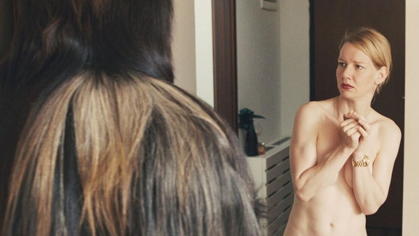 Father and daughter in some decidedly odd confrontations in the dark comedy, Toni Erdmann.