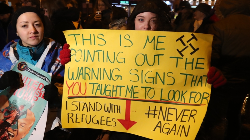 Members of the Campaign Group United Against Racism during the rally