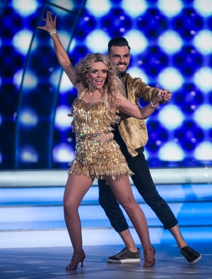 Week 5: Denise and Ryan were going for gold with their stunning samba. That dress was made for twirling in!
