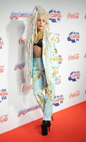 8. An usual (unusual) Gaga outfit from Versace paired with blond locks and platform heels for the Jingle Bell Gala in London in 2013.