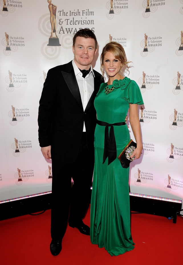 The actress wore a dreamy emerald gown by designer Belle & Bunty to the 2012 Irish Film and Television Awards ceremony pictured here with hubby Brian O'Driscoll.