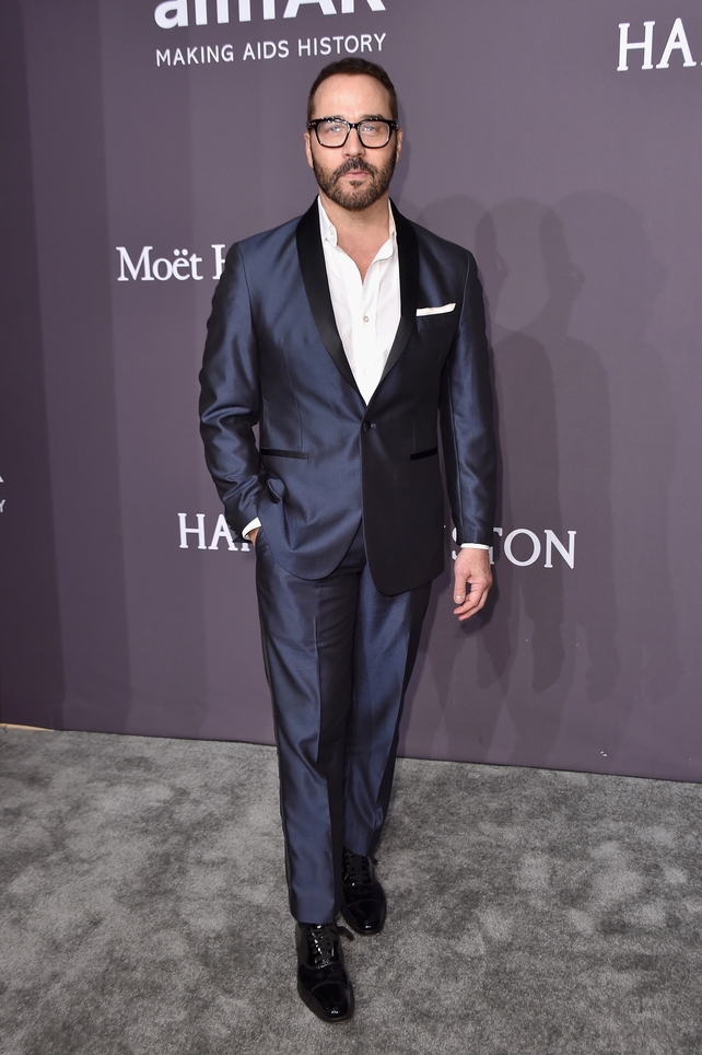 Entourage actor Jeremy Piven looks slick in a navy suit.