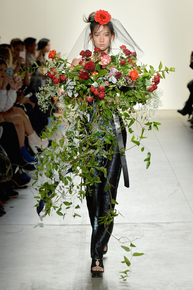 Thursday Day 1: A flower among flowers at the Adam Selman fashion show.