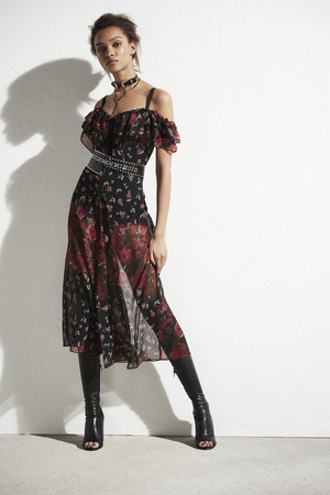 We love the roses pattern on this River Island off-the-shoulder dress. Perfect for your next holiday.