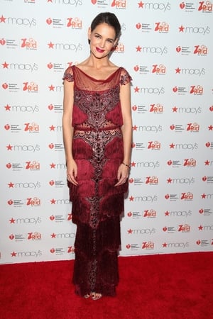 Thursday Day 1: Katie Holmes looks beautiful in vintage frills at the American Heart Association's Go Red For Women show.