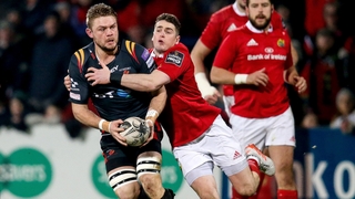 Munster's Ronan O'Mahony tackles Lewis Evans of the Dragons