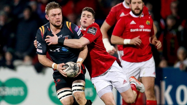 Munster's Ronan O'Mahony tackles Lewis Evans of the Dragons
