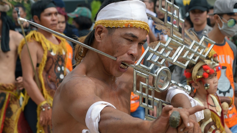 A Tatung participates in the Cap Go Meh parade