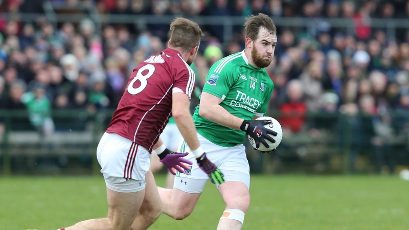 Paul Conroy chasing down Fermanagh dangerman Sean Quigley