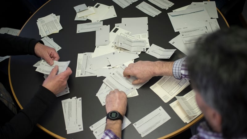 Municipal workers counting votes in Switzerland today