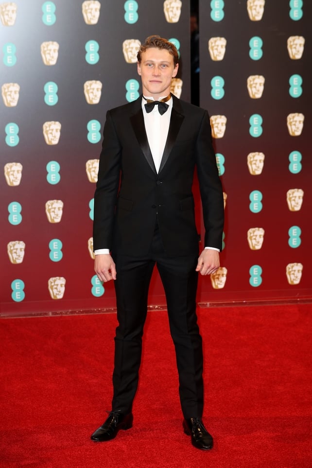 Captain Fantastic star George MacKay looked very handsome in his tux and even had his trademark locks cut for the event!