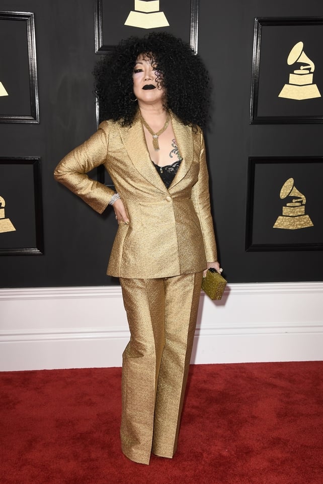 Worst: Margaret Cho are you in there? Big hair, black lips and power house gold suit. Looks like the comedian is having fun though.
