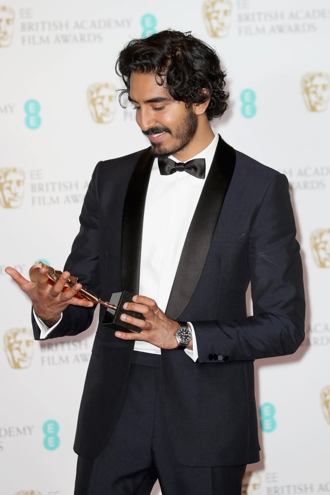 Dev Patel wore Burberry collecting his BAFTA for his Best Actor in a Supporting Role in Lion.