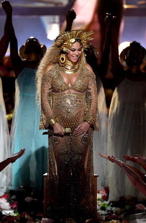 At this year's Grammys, Beyoncé proved that she ran the world in her Peter Dundas dress and crown.