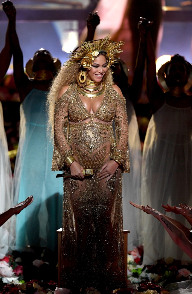 At this year's Grammys, Beyoncé proved that she ran the world in her Peter Dundas dress and crown.
