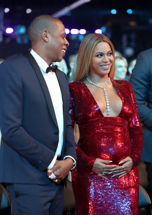 The parents-to-be looked super happy together last night and check out that diamond necklace!