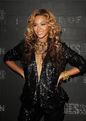 Queen B and her shy baby bump under a sequined blazer and pants a the launch of House Of Dereon By Beyonce And Tina Knowles.