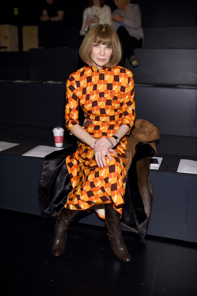 Sunday Day 4: Another snap of Anna Wintour attending the Prabal Gurung fashion show in a geometric orange tones dress.
