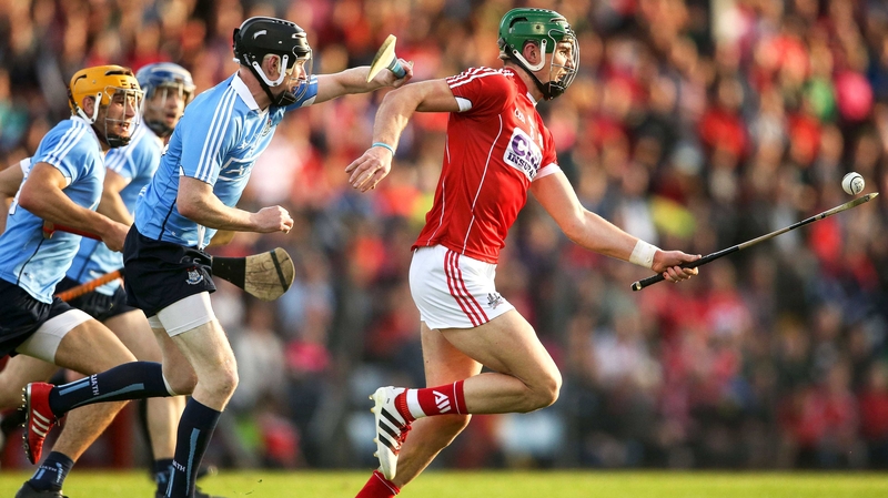 Aidan Walsh (R) evades Oisin O'Rorke of Dublin in last summer's All-Irerland SHC qualifier